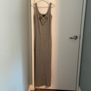 Excellent condition Bebe dress. Worn 3x. Needs a steam to get the wrinkles out.